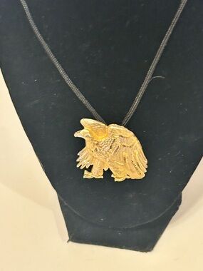 Textured Gold tone Eagle Pendant Necklace on Black Cord